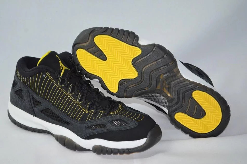 Black and yellow jordan 11s online